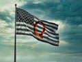 Concept background QAnon or Q Anon deep state conspiracy theory waving usa flag against dramatic sky