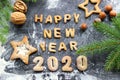 The concept 2020. Baked letters Happy New year and numbers 2020.Greeting card with gingerbread Royalty Free Stock Photo