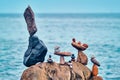 Concept of balance and harmony - pebble stone stacks on the beach