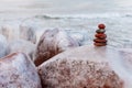 Concept of balance and harmony. Winter rock Zen. Royalty Free Stock Photo