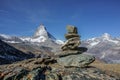 Concept of balance, stable and equal stacked rocks on the alp with matte