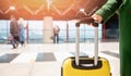 Concept banner airplane travel woman in green coat holds passport with ticket and yellow suitcase airport Royalty Free Stock Photo