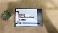 Concept of BCL - Bank Confirmation Letter write on paperwork isolated on Wooden Table Royalty Free Stock Photo
