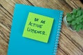 Concept of Be An Active Listener write on sticky notes isolated on Wooden Table