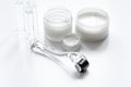 Concept beautician desktop with mezoroller - mesotherapy on white background Royalty Free Stock Photo