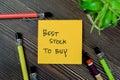 Concept of Best Stock To Buy write on sticky notes isolated on Wooden Table