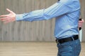 The concept of betrayal business. businessman holds out his hand for a handshake and holds a knife behind his back Royalty Free Stock Photo