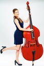 Concept for big business with business woman doublebass play . Royalty Free Stock Photo