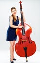 Concept for big business with business woman doublebass play . Royalty Free Stock Photo