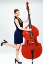 Concept for big business with business woman doublebass play Royalty Free Stock Photo