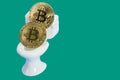 Concept of bitcoin losing value bitcoins in toilet clipping path, copy space Royalty Free Stock Photo