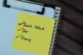 Concept of Book Value Per Share write on a sticky notes isolated on Wooden Table Royalty Free Stock Photo