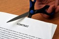Contract cut with scissors in close-up
