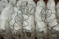 The concept of a broken bed mattress. Close-up of an old worn mattress and springs. Royalty Free Stock Photo