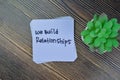 Concept of We Build Relationships write on sticky notes isolated on Wooden Table