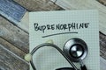 Concept of Buprenorphine write on sticky notes with stethoscope isolated on Wooden Table