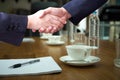 Concept business agreement hands shaking in conference room with Royalty Free Stock Photo