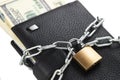 Concept of business safety or financial protection or restriction access. Wallet in chain with padlock isolated on white