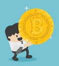 Concept businessman carrying huge Bitcoins