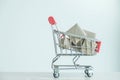 concept of buy shopping, Red shopping cart full of gifts box Royalty Free Stock Photo