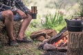 The concept of camping the guy on the nature of the fire Royalty Free Stock Photo
