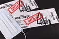 Concept for cancelled entertainment events during Corona virus pandemic with concert tickets and red `cancelled` stamp Royalty Free Stock Photo