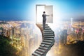 Concept of career ladder and door with businessman Royalty Free Stock Photo