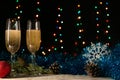 The concept of celebrating the New Year and Christmas. Dinner of a couple with two glasses of champagne. Royalty Free Stock Photo