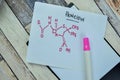 Concept of chemical molecular formule hormone Penicillin write on sticky notes isolated on Wooden Table