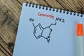 Concept of chemical molecular formule hormone serotonin write on book isolated on Wooden Table
