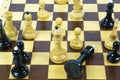 Concept of chess game with realistic Board and black-and-white figures. Royalty Free Stock Photo