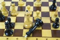 Concept of chess game with realistic Board and black-and-white figures. Royalty Free Stock Photo