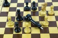 Concept of chess game with realistic Board and black-and-white figures. Royalty Free Stock Photo