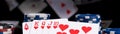The concept of chips and cards for playing poker on the background of a flying cards, a long photo Royalty Free Stock Photo