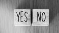 yes or no on wooden blocks. Business concept. Black white photo Royalty Free Stock Photo