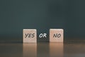 concept of choice yes or no on wooden cubic blocks. Business and lifestyle concept. Think With Yes Or No Choice, Business Choices Royalty Free Stock Photo