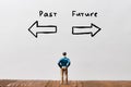 The concept of choosing a path to the past or to the future with a person and a shooter Royalty Free Stock Photo
