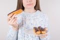 Concept of choosing the way of life style. Cropped close up photo of lady trying not to eat yummy delicious meal isolated grey