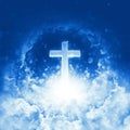 Concept of christian religion shining cross on background of cloudy sky. Divine shining heaven. Sky cross and beautiful clouds Royalty Free Stock Photo