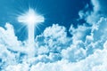 Concept of christian religion shining cross on the background of cloudy sky. Sky with cross and beautiful cloud. Divine shining