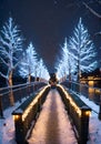 Christmas Lights On A Bridge, With A View Of A Snowy Riverbank. Generative AI Royalty Free Stock Photo
