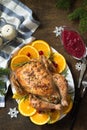 Concept of Christmas or New Year dinner roasted turkey stuffed with rice. Royalty Free Stock Photo