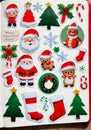 A Christmas-Themed Sticker Collection, In A Scrapbook With Holiday Memories. Generative AI