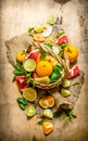 The concept of citrus. Basket of citrus fruits - grapefruit, orange, tangerine, lemon, lime .