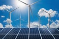 concept clean energy power. solar panel with wind turbine and blue sky background Royalty Free Stock Photo