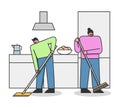 Concept Of Cleaning Service. Cleaning Stuff Clean Apartment. Man And Women Sweeping The Floor On The Kitchen Royalty Free Stock Photo