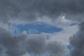 Climate changes the bright blue sky was about to be covered with black clouds. Royalty Free Stock Photo