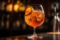 Closeup glass of aperol spritz cocktail decorated with orange at bar background. Generative AI Royalty Free Stock Photo