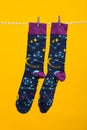 Concept of clothes for legs - socks, socks hanging on rope