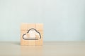 Concept of cloud computing. Stack of wooden block cube with computing icon online connection database digital. upload and download Royalty Free Stock Photo